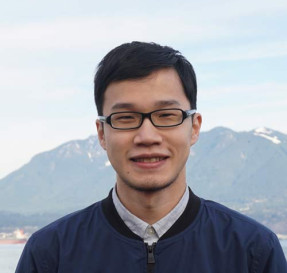 Portrait of Gilbert Lin with mountains in the background
