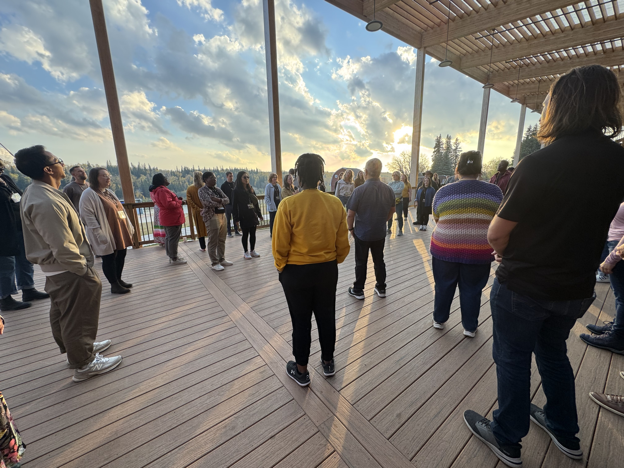 Gathering on the patio at the beginning of the SVI Alberta conference