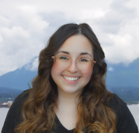 Portrait of Elena Guillen with mountains in the background